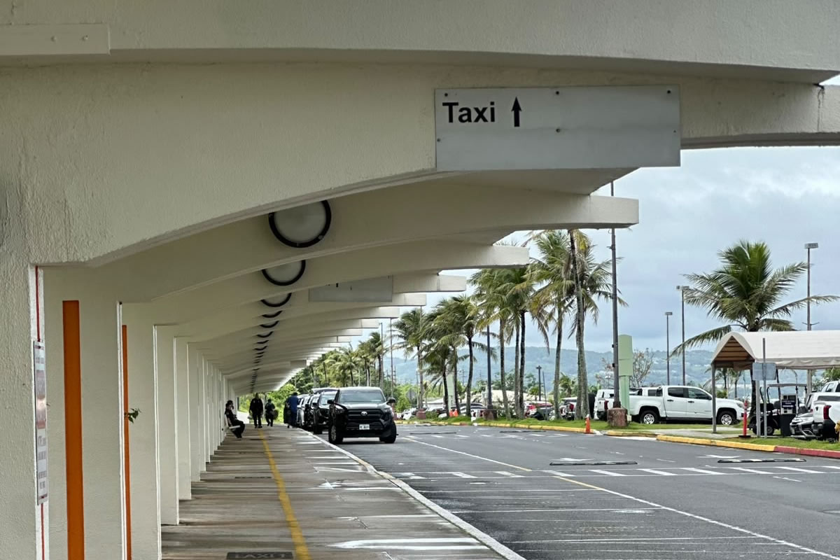 Exit through "West Arrivals" and the taxi stand is on your left. The official fare table is posted there too.